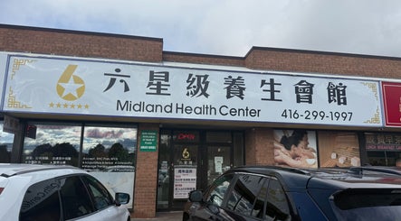 Front view of Midland Health Center in Toronto, Ontario, CA showcasing its signage and entrance.