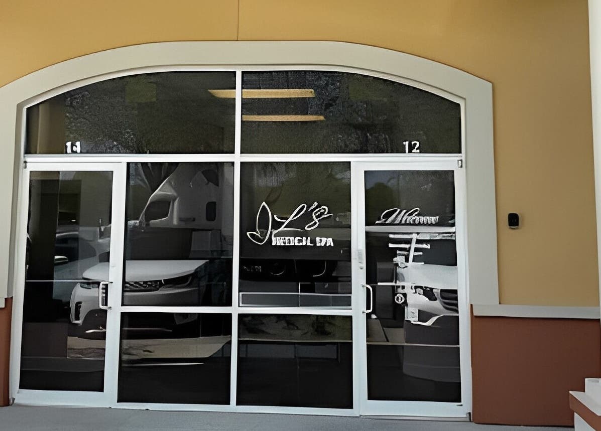 Entrance of LS Medical Spa and Institute showing glass doors at Orlando, Florida, US.