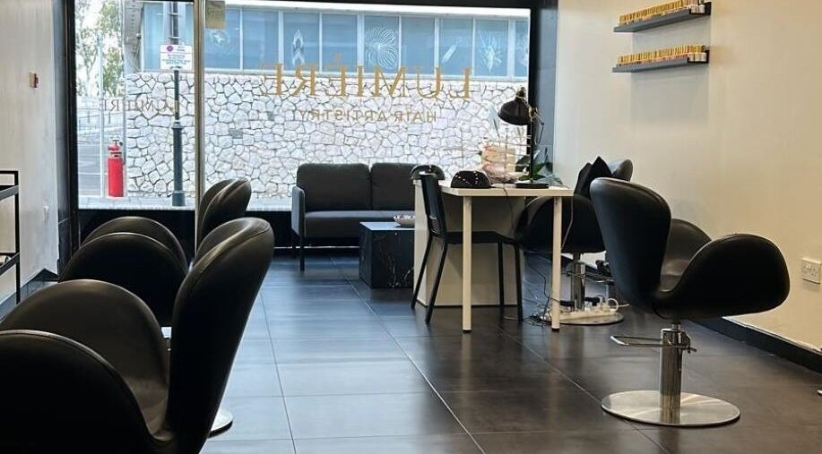 Stylish salon seating at Lumiere Hair Artistry, Gibraltar, GI, offering a modern and welcoming atmosphere.