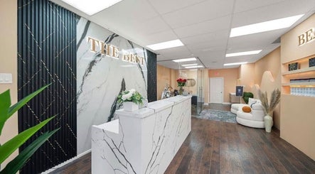Luxurious interior of Lullea Nails Shop's reception in Toronto, Ontario, CA with marble accents.