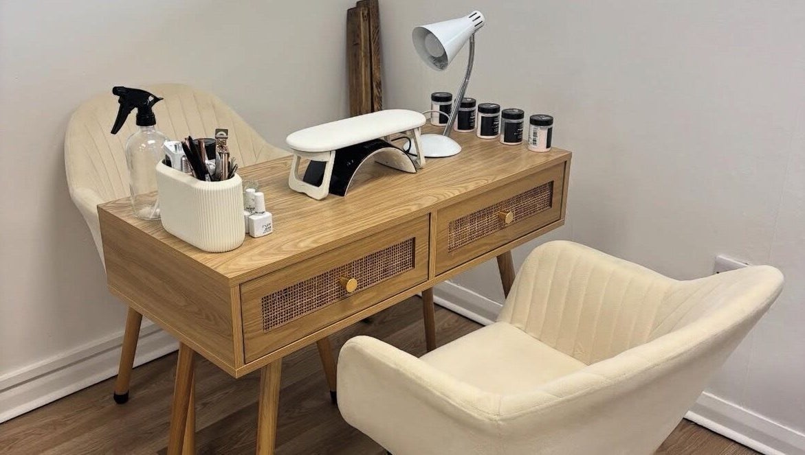 Stylish nail station at Tnt Nails, Worcester, England, GB featuring elegant decor and manicure tools.