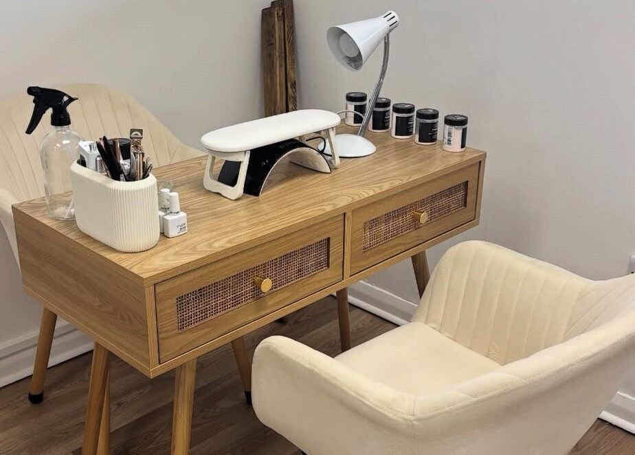 Stylish nail station at Tnt Nails, Worcester, England, GB featuring elegant decor and manicure tools.