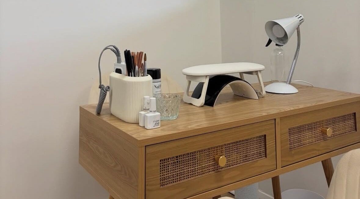 Nail care desk with tools at Tnt Nails, Worcester, England, GB, showcasing neat organization.