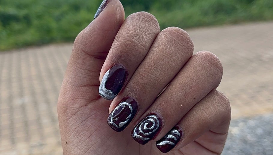 Intricate nail art at Lexcie_nails, Paramaribo, Paramaribo District, SR showcasing elegant designs.
