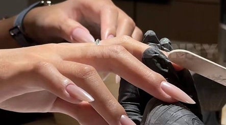 Professional manicure session at Nails Studio, Steamboat Springs, Colorado, US, showcasing detailed nail care.