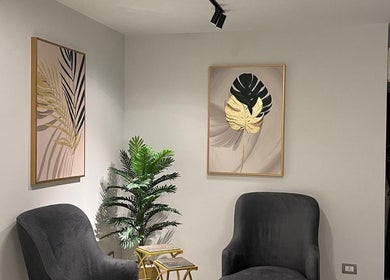 Tranquil seating at Lashology.anna, Melbourne, Victoria, AU with art and plants setup.