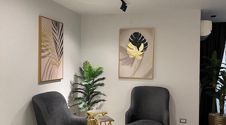 Tranquil seating at Lashology.anna, Melbourne, Victoria, AU with art and plants setup.
