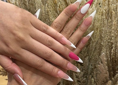 Stylish nails at Lashology- Lashes and Nails by Anna, Melbourne, Victoria, AU. Chic pink and white design on hands.
