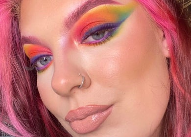 Colorful eye makeup at Poppy’s Make Up & Beauty Bar, Redditch, England, GB showcasing rainbow hues.