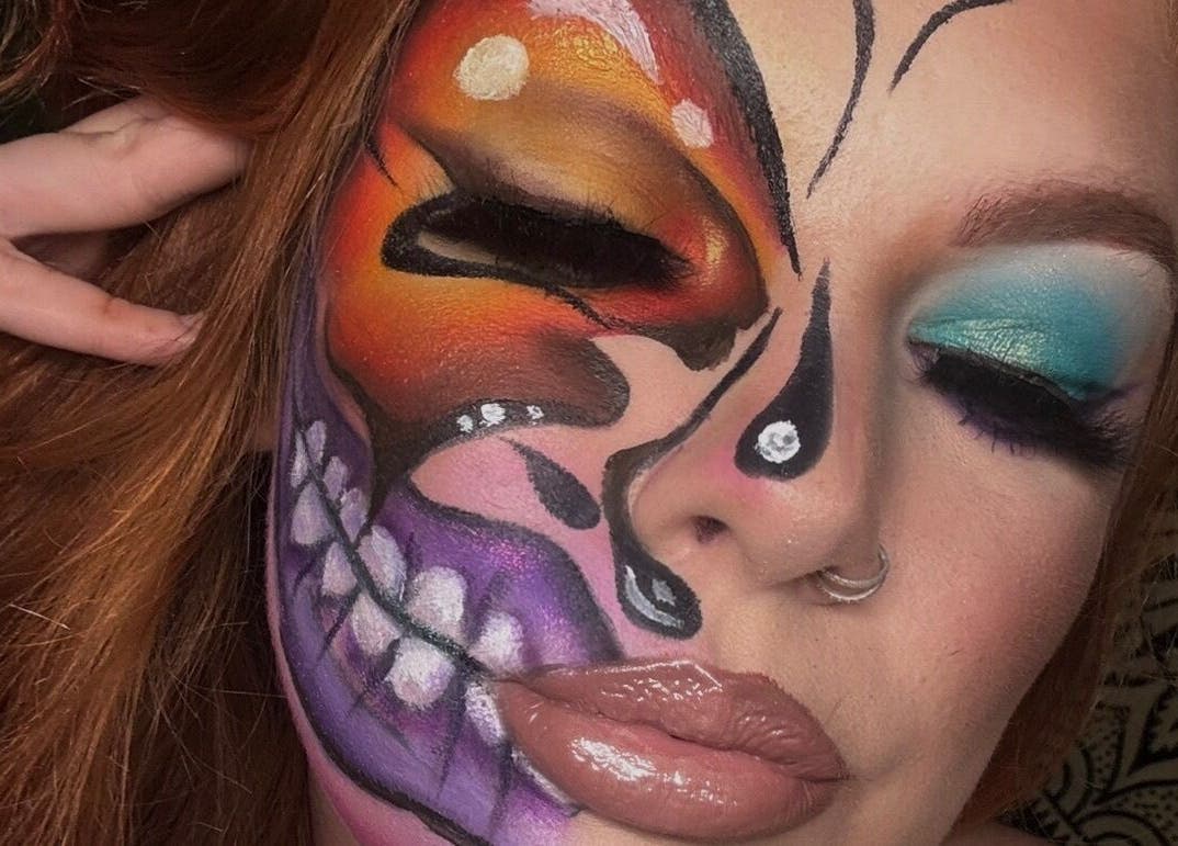 Creative half-face makeup at Poppy’s Make Up & Beauty Bar, Redditch, England, GB showcases colorful artistry.