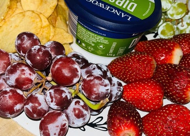 Fresh grapes, strawberries, chips, and dip at 20Thirteen Beauty Spa, Pretoria, Gauteng, ZA.