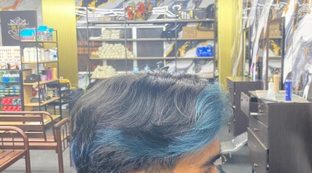 Modern salon interior at Aizat Maifar, Kuala Lumpur, highlighting stylish hair color service.