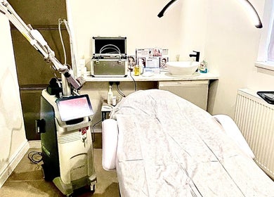Modern treatment room at NovaLx Aesthetics Clinic, Brierley Hill, England, GB featuring advanced laser equipment.