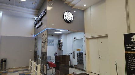 Entrance of 24 minutes salon in Abu Dhabi, showcasing modern design and welcoming ambiance.