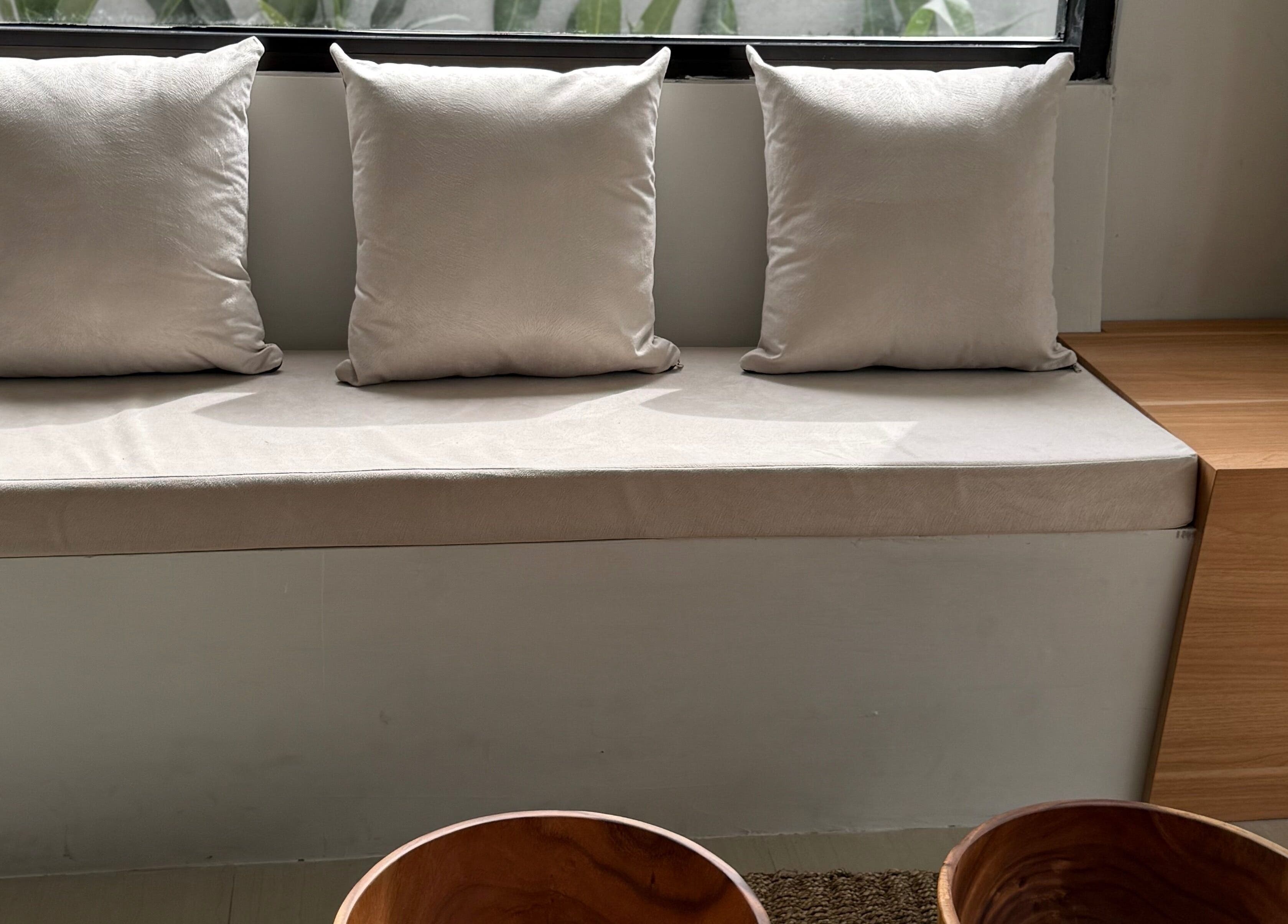 Cozy seating area at Body Wonders SPA & Massage, Bali, Bali, ID, with plush cushions and minimalist decor.