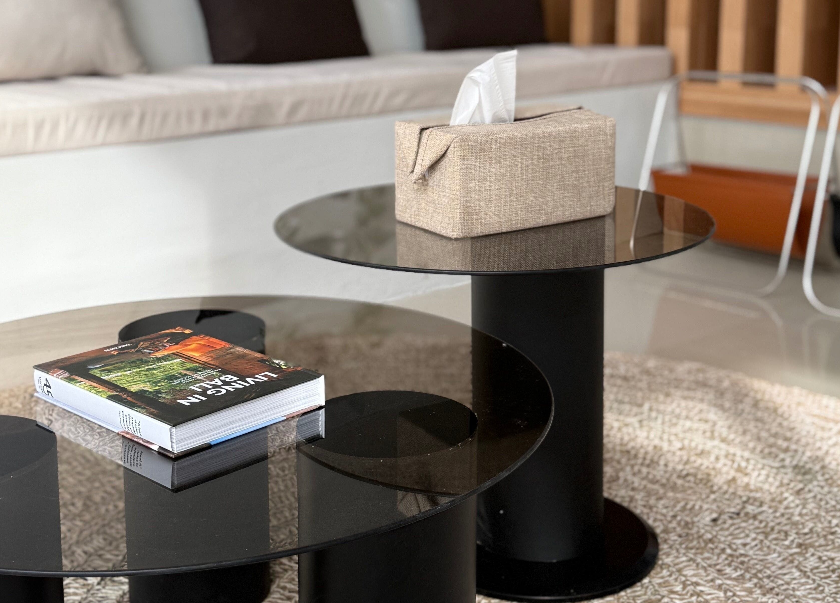 Modern lounge area at Body Wonders SPA & Massage, Bali, Bali, ID with glass tables and cozy decor.