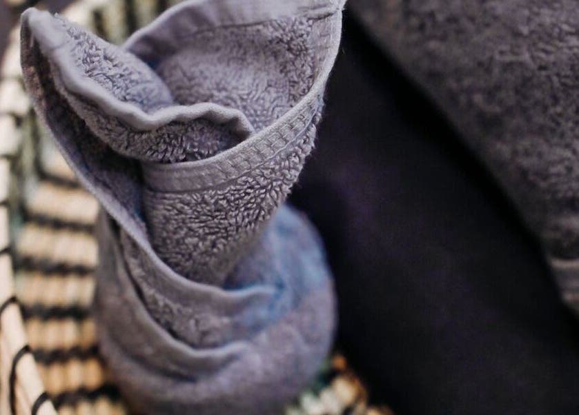 Elegant folded gray towel at Body Wonders SPA & Massage, Bali, Bali, ID, highlighting luxury relaxation.