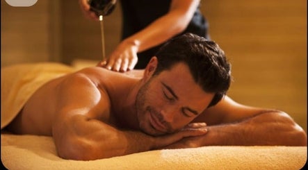 Relaxing massage at Dolce Relax Unisex Salon and Spa Wellness, Bangalore, IN. Experience tranquility and wellness.