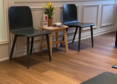 Inviting waiting area at Glamify Wellness Spa, Vaughan, Ontario, CA with modern chairs and decor.
