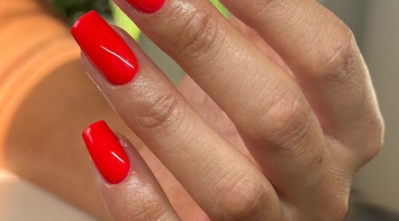Vibrant red nail art byaleksrose, Edgware, England, GB. Perfect manicured nails showcasing beauty and elegance.