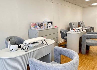 Modern nail salon setup at Vera Beauty & Aesthetic in Brighton And Hove, England, GB, featuring stylish chairs.