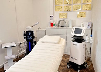 Sleek treatment room at Vera Beauty & Aesthetic, Brighton And Hove, England, GB, showcasing modern devices and decor.