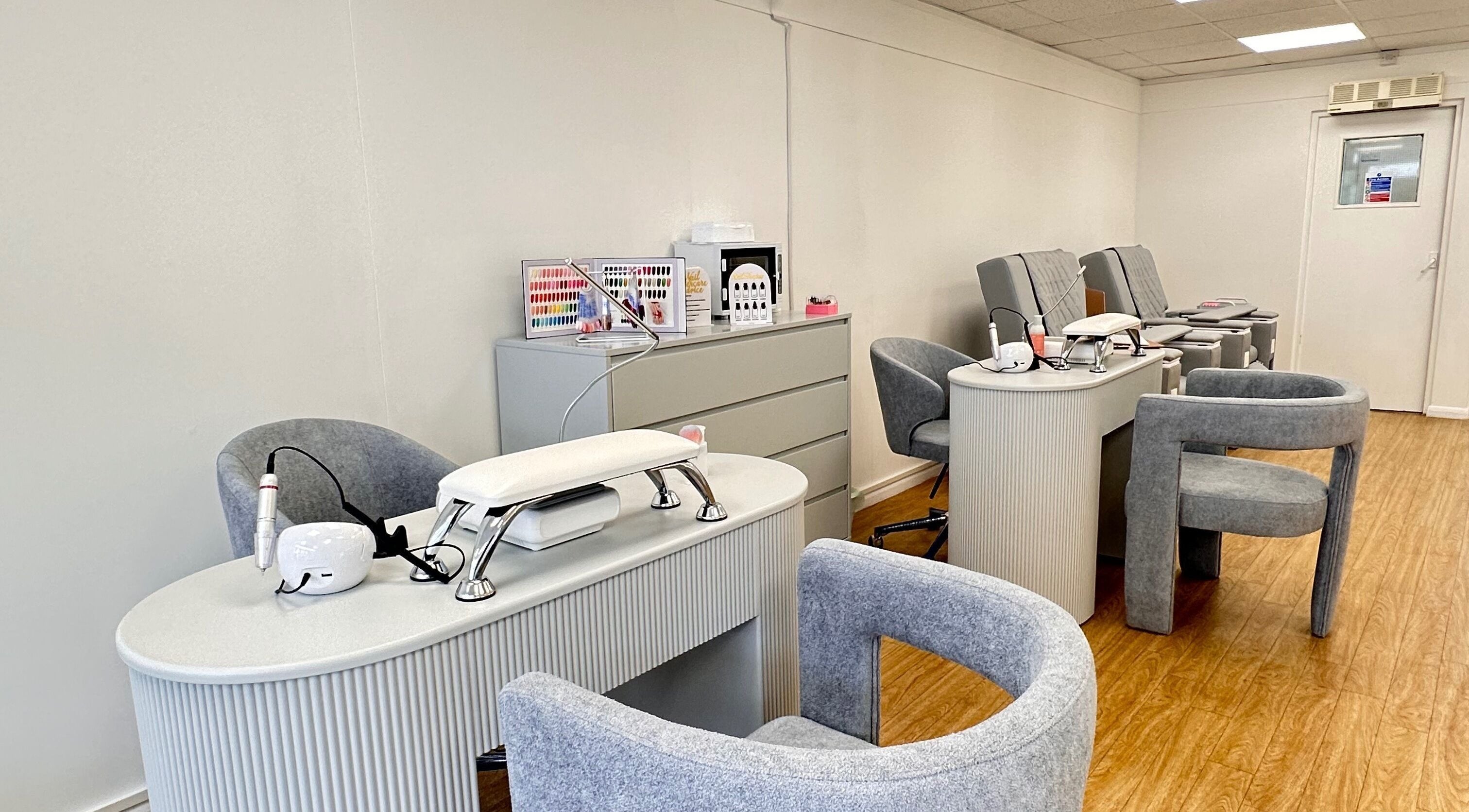 Elegant manicure station at Vera Beauty & Aesthetic, Brighton And Hove, England, GB, with plush seating and decor.