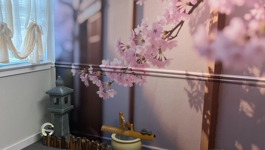 Serene cherry blossom decor at Wu Therapeutic Massage and Head Spa in Fairfax, Virginia, US.