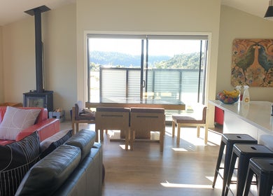 Spacious, sunlit living area at Bless The Mess Cleaning Co. in Wānaka, Otago Region, NZ.