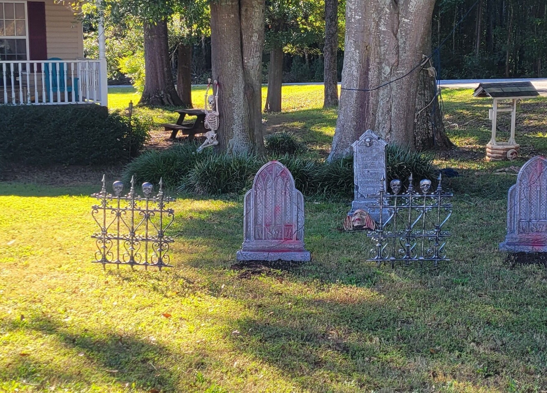 Charming front yard with Halloween decorations at Halo Majesty Hair, Lavonia, Georgia, US.