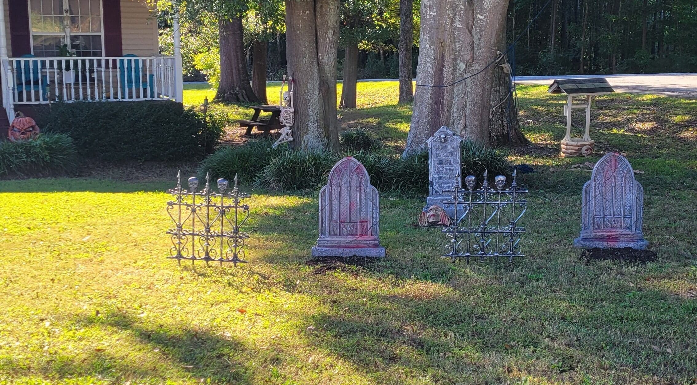 Charming front yard with Halloween decorations at Halo Majesty Hair, Lavonia, Georgia, US.