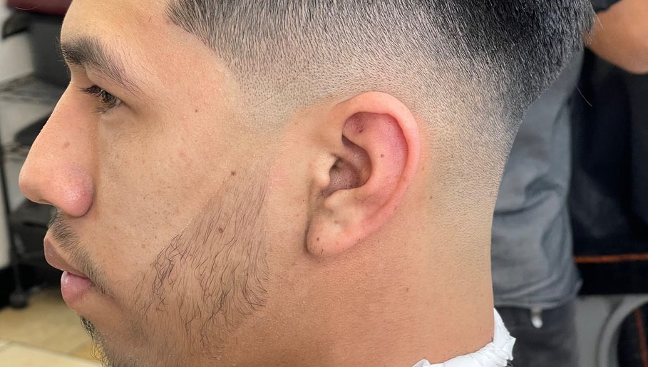 Close-up of a stylish fade haircut at Kecho’s Barbershop in Dallas, Texas, US.