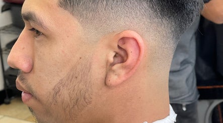 Close-up of a stylish fade haircut at Kecho’s Barbershop in Dallas, Texas, US.