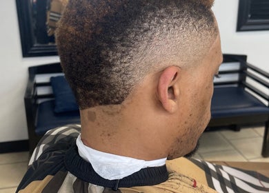 Close-up of a stylish fade haircut at Kecho’s Barbershop, Dallas, Texas, US.