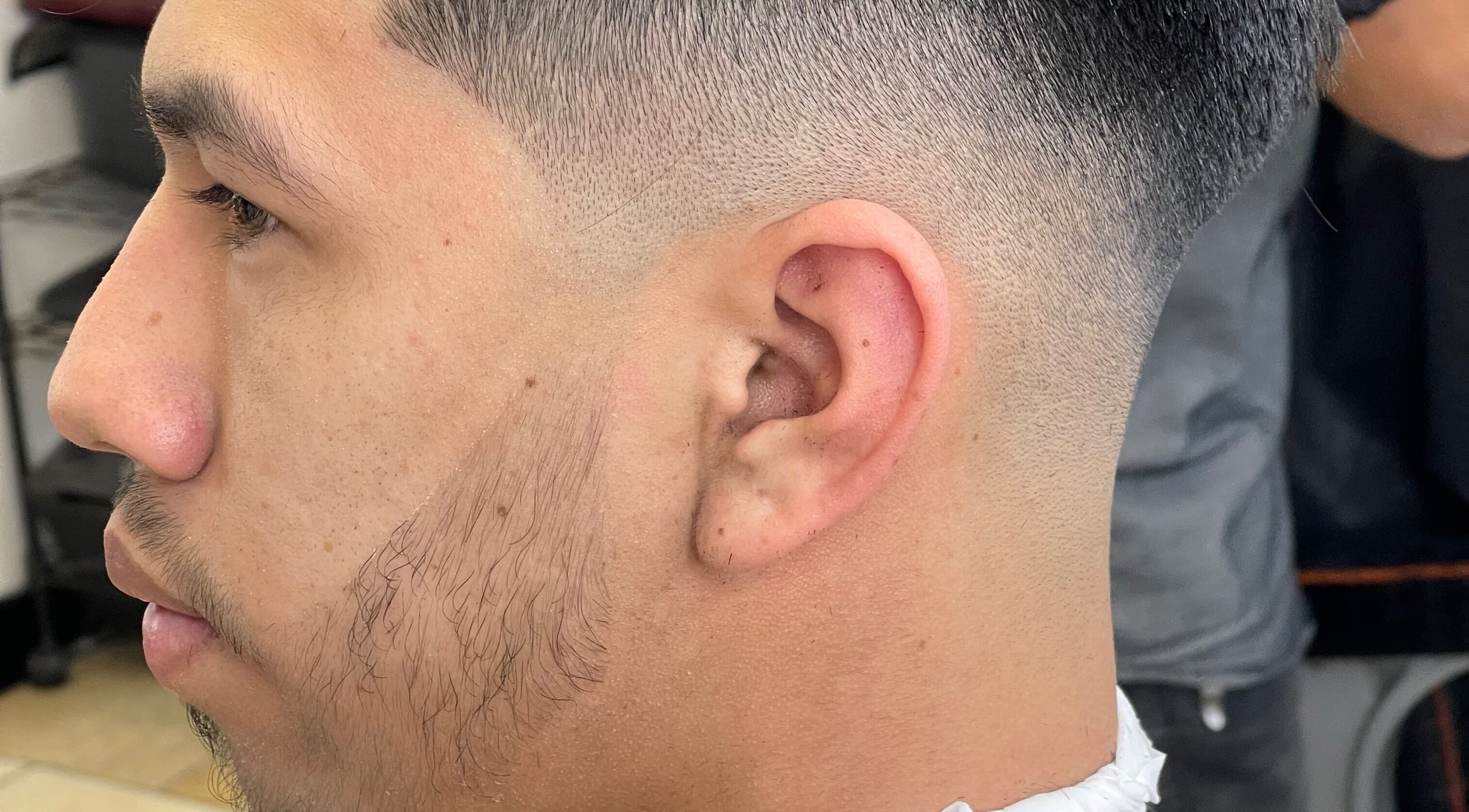 Close-up of a modern fade haircut at Kecho’s Barbershop, Dallas, Texas, US.