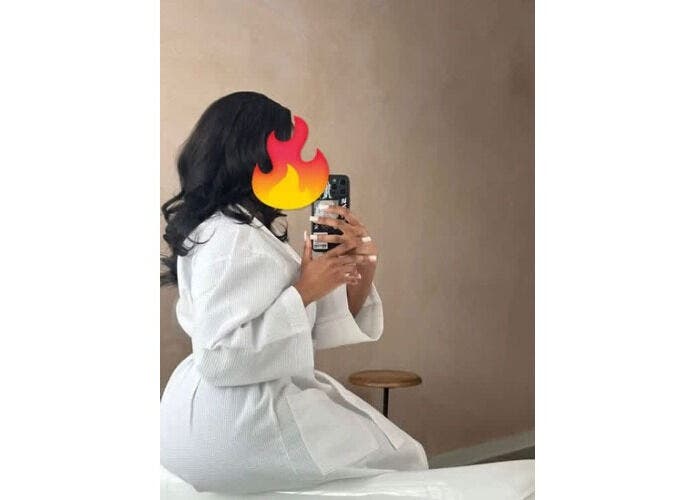 Guest enjoying tati’s mobile massage service, Lusaka, Lusaka Province, ZM, in a serene setting.