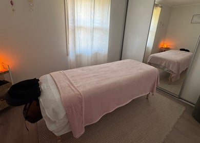 Serene massage room at Azur Coast Massage by Jess, O'sullivan Beach, South Australia, AU.