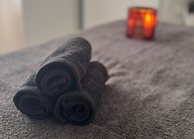 Towels and candle setup at Azur Coast Massage by Jess, O'Sullivan Beach, South Australia, AU.