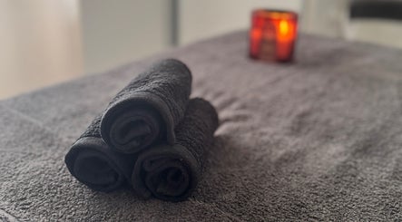 Towels and candle setup at Azur Coast Massage by Jess, O'Sullivan Beach, South Australia, AU.