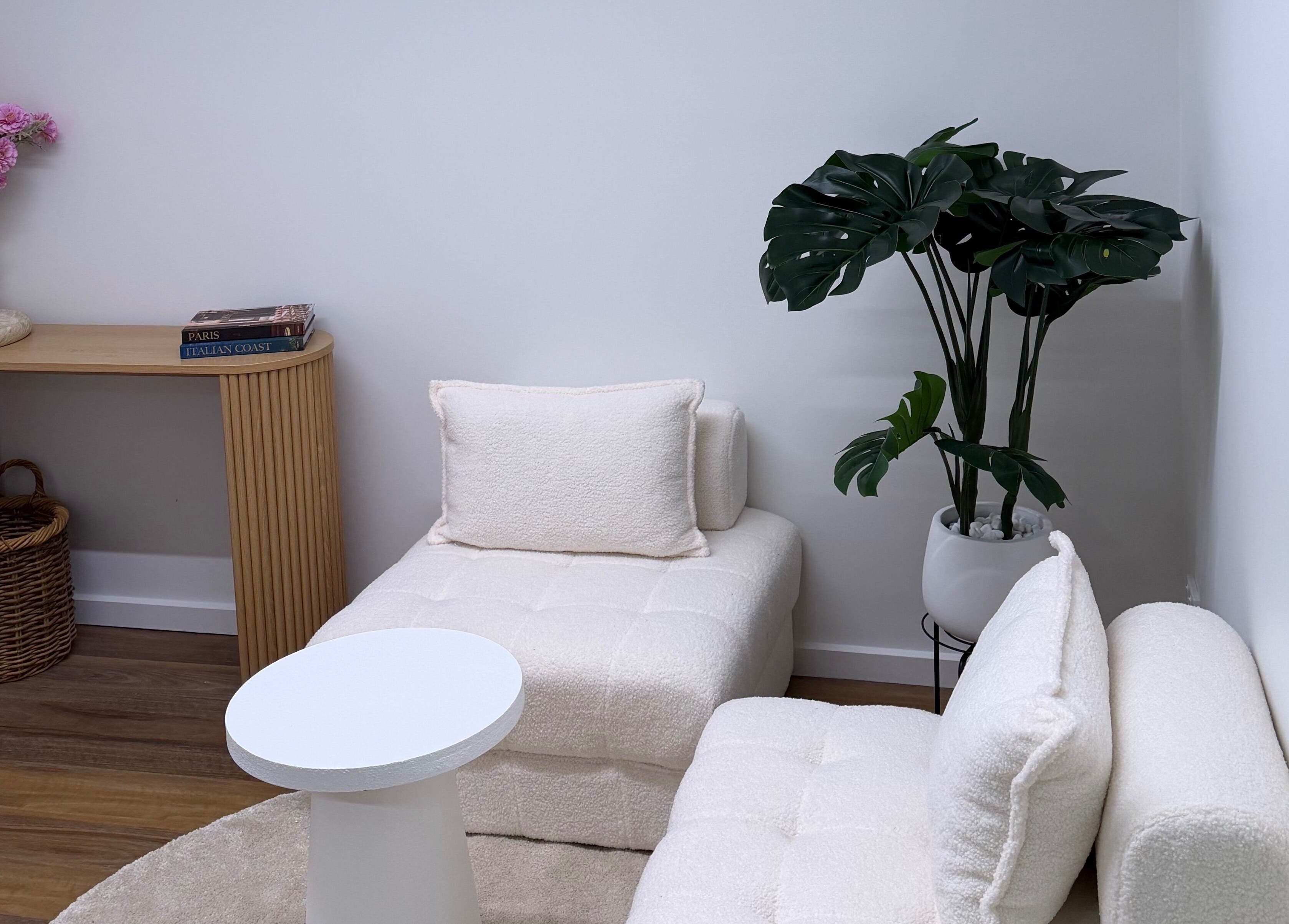 Elegant seating area at BRNZD, Hawker, Australian Capital Territory, AU with plush chairs and decor.