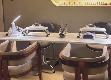 Chic nail station at Saje Beauty Lagos on Street, Lagos, NG, showcasing modern design and elegant seating.