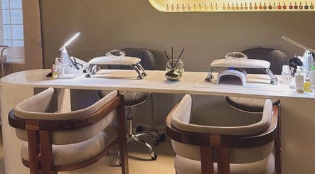 Chic nail station at Saje Beauty Lagos on Street, Lagos, NG, showcasing modern design and elegant seating.