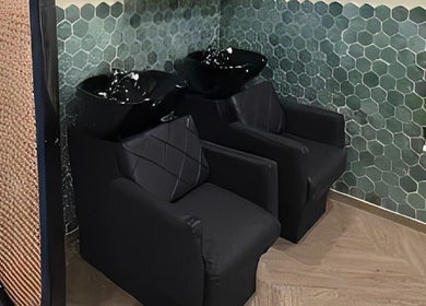 Luxurious shampoo chairs at Saje Beauty Lagos, Street, Lagos, NG offering a relaxing spa experience.