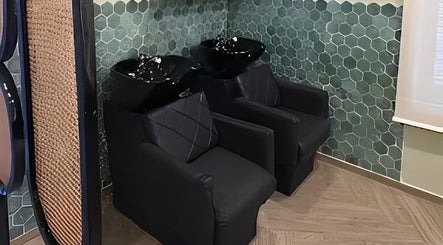Luxurious shampoo chairs at Saje Beauty Lagos, Street, Lagos, NG offering a relaxing spa experience.