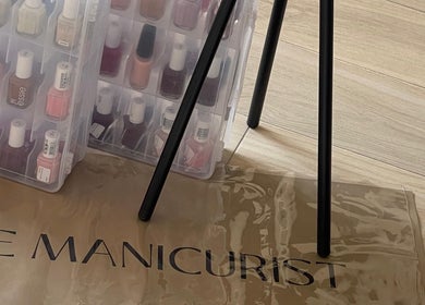 Nail polish collection at The Manicurist, Dubai, Abu Dhabi, AE, showcasing a variety of vibrant colors.