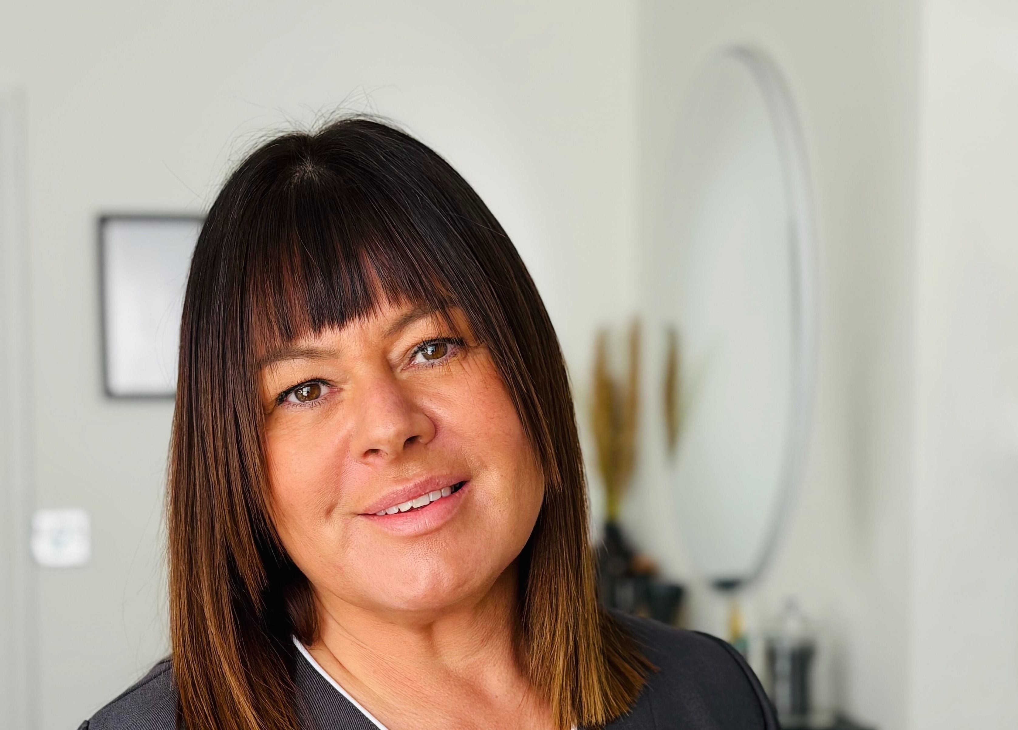 Friendly staff member at My Face Atelier, High Wycombe, England, GB, ready to assist clients.