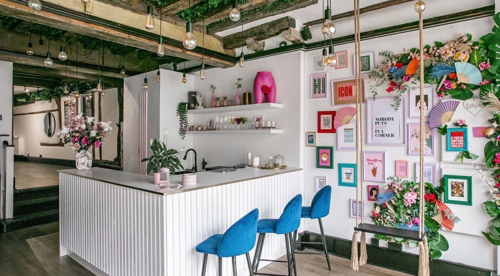 Stylish interior of My Face Atelier, High Wycombe, England, GB, featuring vibrant decor and cozy seating.