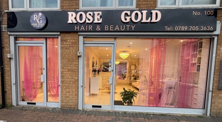 Front view of Rose Gold Hair & Beauty in Hounslow, England, GB, with pink decor and stylish interior.