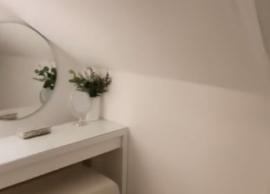 Elegant vanity at icedbyrosey_ in Kardinya, Western Australia, AU featuring a round mirror and decor.