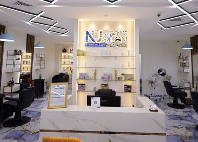 Sophisticated interior of NU Gent's Salon in Dubai, Dubai, AE, showcasing modern design and amenities.